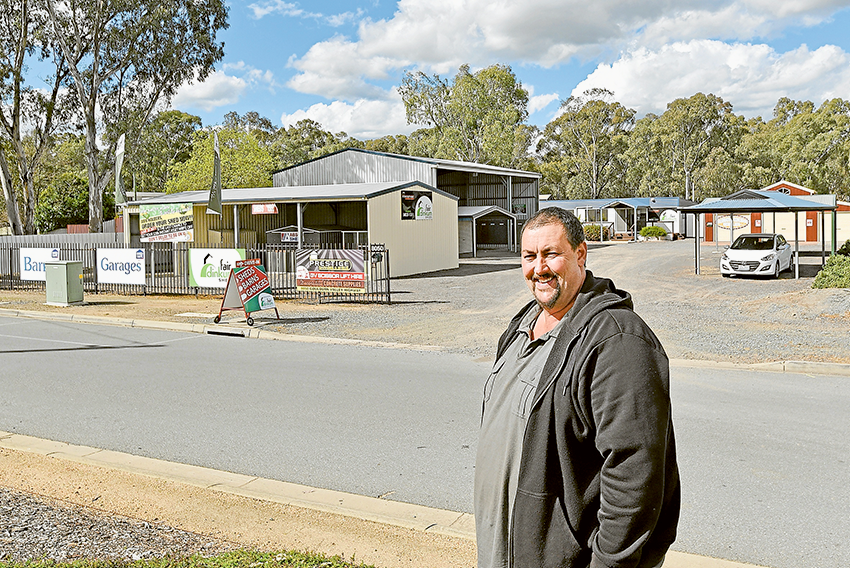 If you’re Fair Dinkum, do it right… Prestige Garages & Sheds business owner, Darryl Barrett can help you pick your next shed made out of Bluescope Steel and genuine COLORBOND® products. Photo: Sharelle Jarvis. 