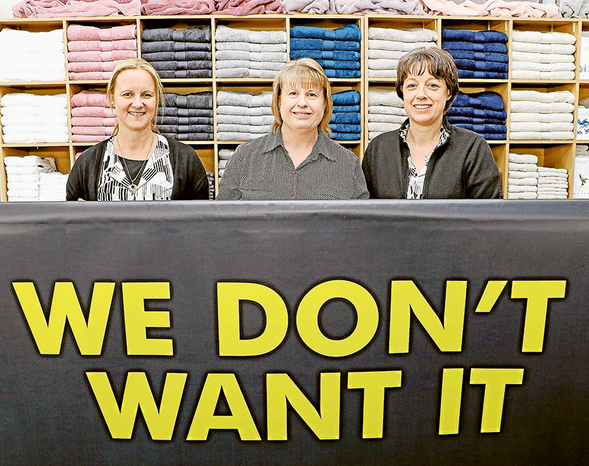 GET INTO FINNY’S… From left, Finny’s Manchester team members, Tina Sicali, Shirley Blick and Darielle Anderson are inviting the community to drop in and take advantage of the ‘We Don’t Want It’ sale. Photo: Katelyn Morse. 