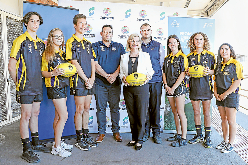 BIG COUP FOR REGION… From left, local footballers, Charlie Di Stefano, Jorja Ayton and Campbell Steigenberger, AFL Goulburn Murray regional general manager, Jamie Macri, Greater Shepparton City Council Mayor, Cr Kim O’Keeffe, V/Line service officer, Tim Karolidis and local footballers, Kasey Boschetti, Kian Roche and Maya Ingham. Photo: Katelyn Morse.