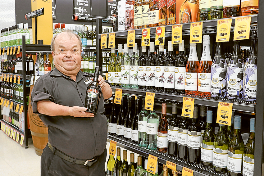 OVER 40 YEARS OF FRIENDLY SERVICE… Cellarbrations Mooroopna manager, Geoff Thompson is always happy to assist with Christmas party celebrations. Photo: Katelyn Morse.