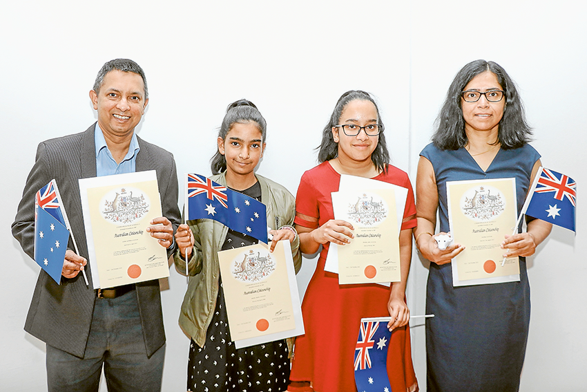 SWORN IN AS AUSTRALIANS… From left, among those sworn in as Australian citizens were family members, Anthony Joachim, Angela Joachim, Lydia Joachim and Kavitha Joachim from Sri Lanka. Photo: Katelyn Morse.