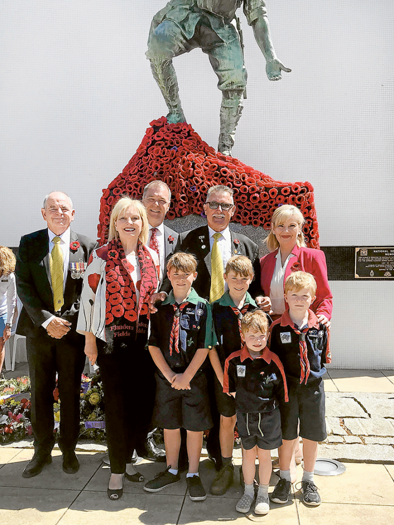 REMEMBRANCE DAY… From left, RSL Shepparton Sub Branch president, Bob Wilkie, Member for Northern Victoria, Wendy Lovell, The Nationals Candidate for Shepparton, Peter Schwarz, 1st Kialla Scouts member, Peter Adams, RSL Shepparton Sub Branch senior vice president, Brian McInneny, 1st Kialla Scouts members, Declan and Theo Adams, Greater Shepparton City Council Mayor, Cr Kim O’Keeffe and 1st Kialla Scouts member, Oliver Adams at the Remembrance Day commemorations on Sunday, which marked 100 years since the guns fell silent and the singing of the armistice. Photo: Geoff Adams.