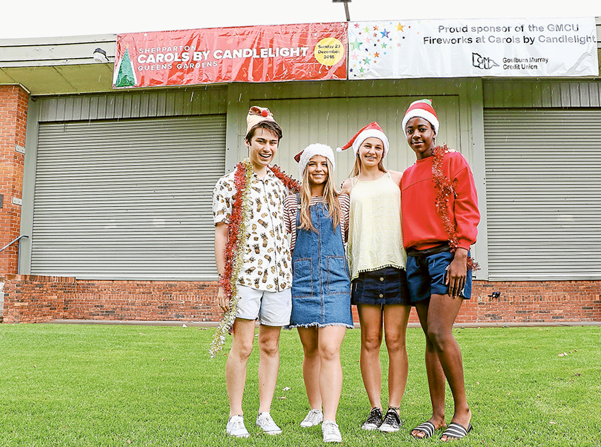 KEEN FOR CAROLS… From left, Sean French, Ruby Davies, Moara Smith and Merdi Yamfu can’t wait to perform the children’s entertainment at Carols by Candlelight. Photo: Katelyn Morse.  