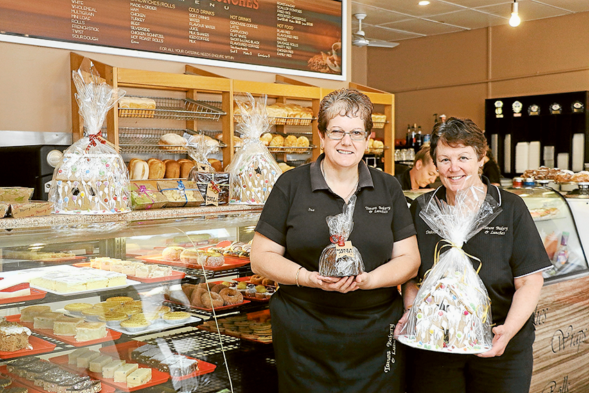 GINGERBREAD BAKED FRESH… From left, Tatura Bakery and Lunches manager, Sue Bevilacqua and owner, Deborah Russell showcasing their exquisite selection of festive treats. Photo: Katelyn Morse.  