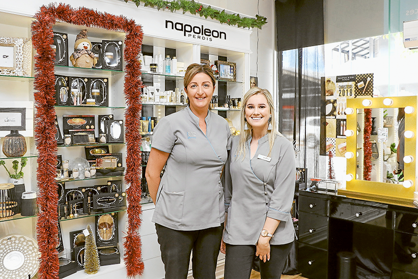 FRIENDLY FACES… From left, Tatura Pharmacy retail manager, Tracy Lowry and pharmacy assistant, Sharna Hamilton are feeling fit for the festive season. Photo: Katelyn Morse.
