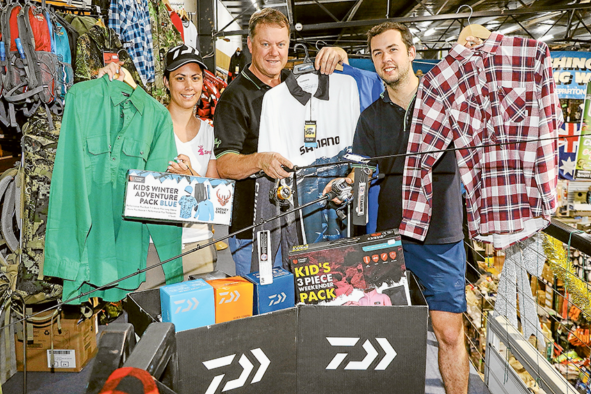 BOXING DAY BARGAINS… From left, Trelly’s Fishing and Hunting World team member, Jaclyn Threlfall, owner, Steve Threlfall and team member, Ross Threlfall have plenty of stock in store for their massive Boxing Day sale. Photo: Katelyn Morse.   