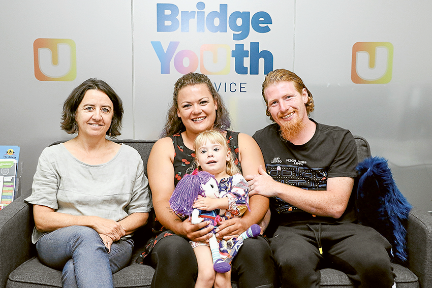 ASSISTING THE YOUTH… From left, The Bridge Youth Service CEO, Melinda Lawley, youth ambassador, Lauren Beks, three-year old, Luna Beks and Lauren’s fiancé, Jayme Mathers. Photo: Katelyn Morse. 