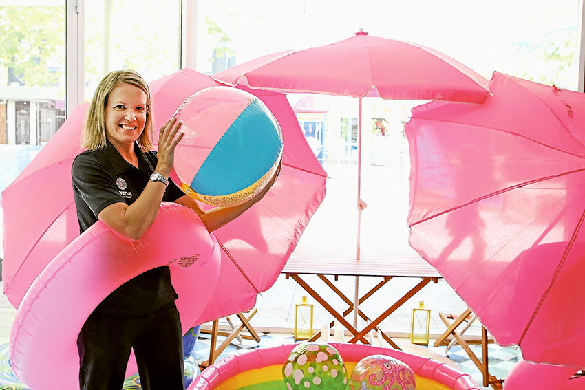 VISUAL MARKETING… Greater Shepparton City Council Place Manager, Bonnie McIntosh inside the shop that has been decked out in a summer theme to help promote the Summer City Market this Friday and Saturday. Photo: David Lee.
