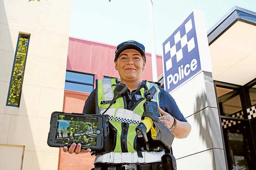 SAFER MEMBERS AND COMMUNITY… Shepparton Police first constable Rechelle McCartney is one of 150 local officers ranked sergeant and below who will be wearing a new personalised body camera. Photo: David Lee.