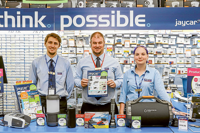 GET READY FOR YOUR ROAD TRIP… From left, Jaycar Electronics staff member, Mathew Vider, store manager, Chris Lane and duty manager, Jaclyn Williams are decked out to help with holiday gadgets. Photo: Katelyn Morse. 