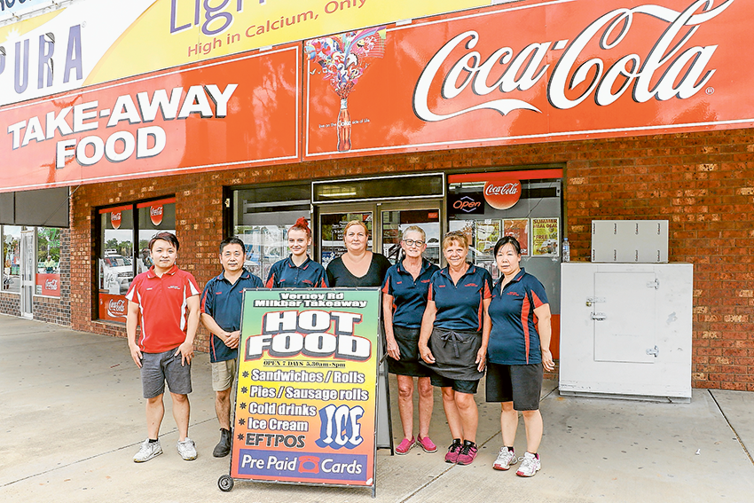 ONE STOP SHOP… From left, Verney Road Milkbar and Takeaway managers, Ching Diao, Terry Diao, team members, Shelby Carson, Cherie Barrett, Irene Knight, Debbie Rhodes and manager, Tammy Yang. Photo: Katelyn Morse.