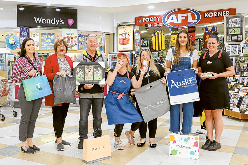 COLLECTED CONVENIENCE… From left, Telstra Shepparton sales consultant, Dani Andrews, Katies sales staff, Lyn Sofra, Footy Korner Games World business owner, John Cooper, Wendy’s owner-manager, Annmarie Michel, Autograph manager, Heather Simpson, Auski Shepparton team member, Georgia Braybon and Jay Jay’s Korner team member, Jaci Cox. Photo: Katelyn Morse. 