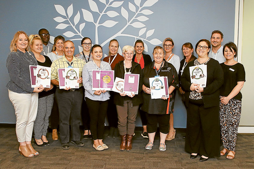 EVERY STEP OF THE WAY… From left, the team at Intereach Shepparton, Michelle Judd, Millie Stephens, Anthony Madu, Gillian McLeod, Simon Humphrey, Alyssa Hamilton, Asma Harrouk, Laura Ash, Jill Smith, Meagan Homewood, Debra McAlister, Stacey Ferrito, Kathy Remilton, Vanessa Cardamone, Dylan Rustem and Yvette Buhagiar who can help take you through all you need to know about the NDIS. Photo: David Lee.