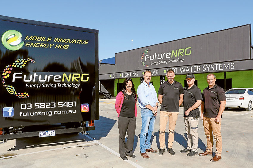 EFFICIENT ENERGY EXPERTS… From left, Future NRG clerical officer, Rebecca Humphreys, director, Graeme Lamb, director, Shaun Gash, sales, Dean Rankin and general manager, Brendan Power alongside the Future NRG Mobile Innovate Energy Hub. Photo: Katelyn Morse. 