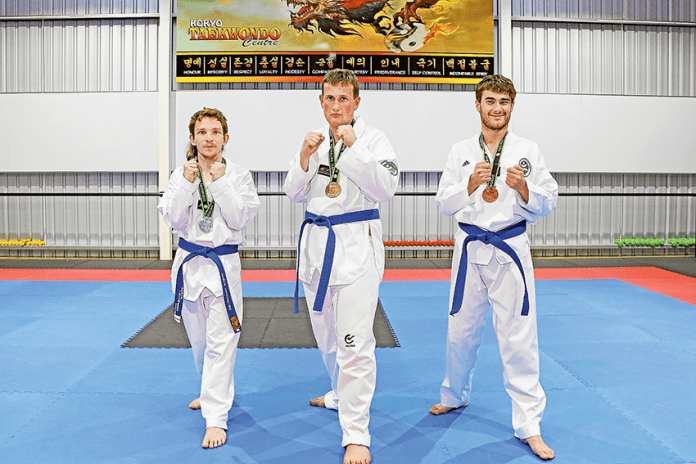 SPORT---Shepp-Access-Taekwondo-Wins MEDAL WINNING PERFORMANCES… From left, representatives of Shepparton Access and Koryo Taekwondo students, Damon Vasterink (silver), Dom Barlo (gold) and Anthony Buonomo (bronze) have come away from the Taekwondo National Championships with medals. Photo: Katelyn Morse.