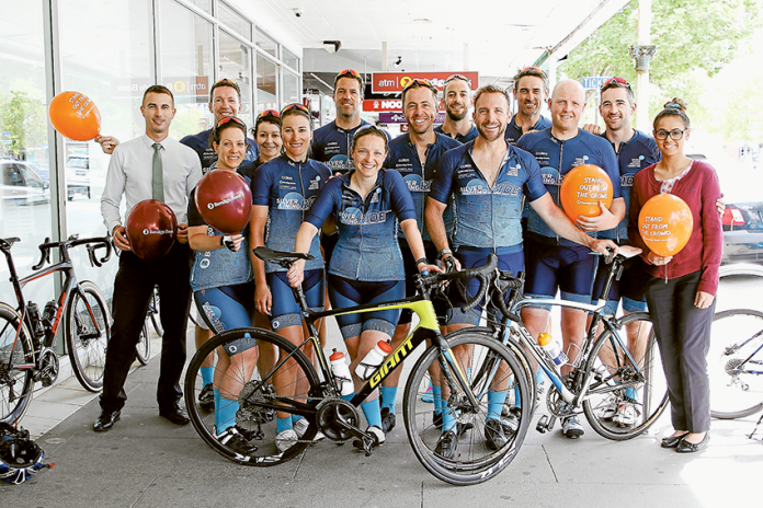 RIDING ALMOST 1,000KM FOR A CAUSE … From left, Shepparton’s Bendigo Bank business banking relationship manager, Jay Nash, Silver Lining Ride participants, Justin Flynn, Emma Cohen, Lissa Marshall, Georgina Wright, Thomas Sorensen, Georgie Herbert, Clint Stanaway, Jake Leslie, Lachlan Spark, Murray Hamblin, Dylan Wissell and Daniel Dell and Bendigo Bank customer service officer, Tahlitha Samkakai. Photo: David Lee.