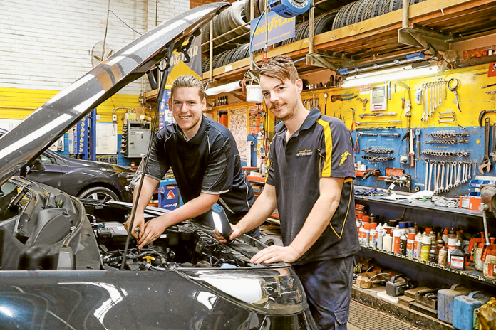 ADV---Central-Tyre-Service AVOID CHRISTMAS BREAKDOWNS… Central Tyre Service apprentice mechanic, Kurtis Scott and qualified mechanic, Daniel Wright are here to ensure your car is safe for those extended Christmas trips. Photo: Katelyn Morse.