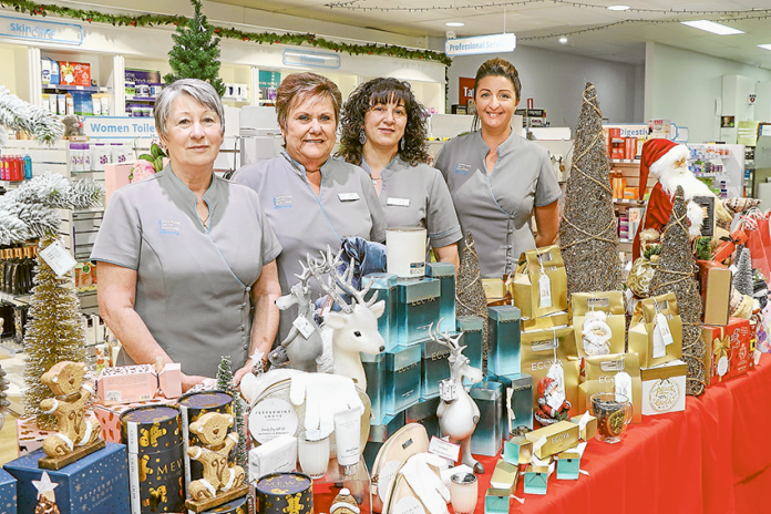 GIFTS AND GOODIES GALORE… From left, Tatura Pharmacy assistants, Merril Quantrell, Gail Wootton, Fran Mandaradoni and retail manager, Tracy Lowry have loaded the shop with Christmas ideas. Photo: Katelyn Morse.