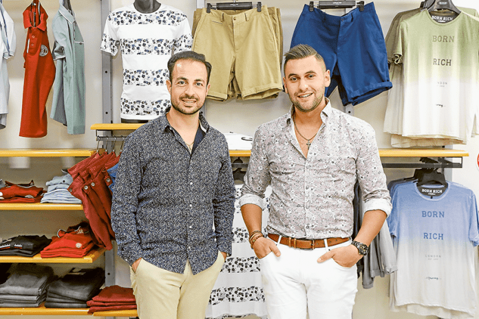SUMMER STYLES ON SALE… From left, Joe Paul Menswear co-owners, Joe Cáre and Paul Kapsalis have some great deals for Boxing Day. Photo: Katelyn Morse.