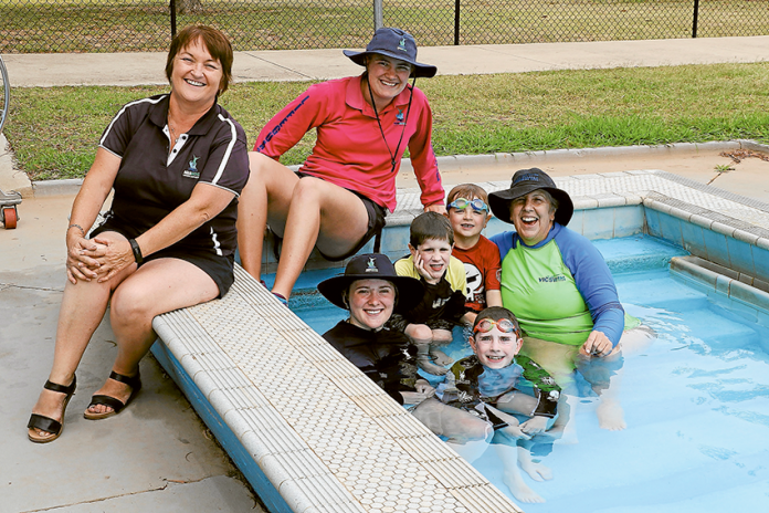 PICTURES BY THE POOL… From left, Aquamoves workgroup co-ordinator of the outdoor season pools, Tess Wheelan, lifeguard, Ebony Halliwell, VicSwim instructor, Alana Cuthbert, Rory Mansfield, 5, Bailey Hamilton, 5, Kade Mansfield, 9, and VicSwim swim teacher, Megan Birks. Photo: Katelyn Morse.