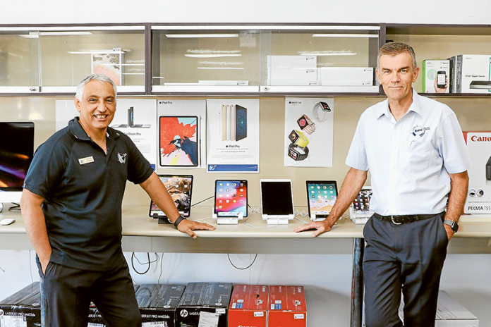 TECHNICAL EXPERTS… From left, Data Parts Shepparton co-owners, Sebastian Mangliameli and Adrian Jones proudly showing off their great range of Apple products. Photo: Katelyn Morse.