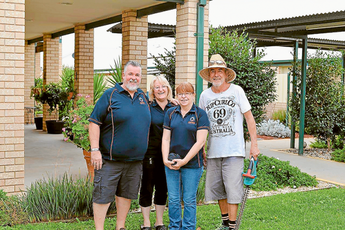 ADV---Eureka-Gardens DROP BY AND SAY HELLO… From left, Eureka Gardens new managers, David and Michele Evans with village cook, Dawn Daley and caretaker, John Phillips. Photo: Supplied.
