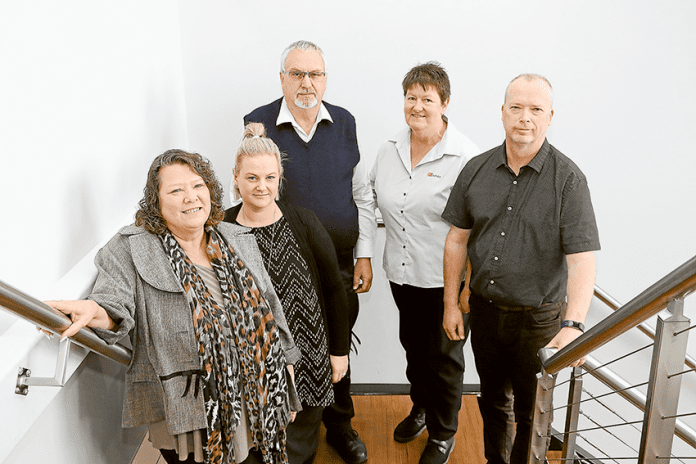 ADV---RI-Advice.EDITED AGED CARE FINANCIAL EXPERTS… From left, RI Advice proprietor and senior adviser, Sandy Miller, adviser, Chenara Newbegin, administrative assistant, Joe Bourke, administration manager, Linda Bourke and senior paraplanner, Nick Barzen. Photo: Katelyn Morse.