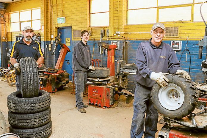 ADV---Central-Tyre-Service EXPERT ADVICE… From left, Central Tyre Service tyre technicians, Phillip Kelly, Nicholas Mark and David Austin are here to help prepare your car before the Easter long weekend. Photo: Katelyn Morse.