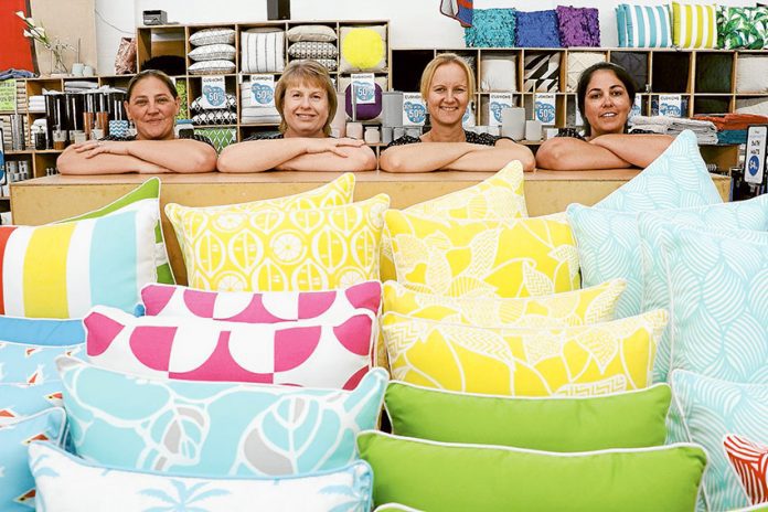 GRAB A BARGAIN… From left, Finny’s Manchester team members, Kerrie Berger, Shirley Blick, Tina Sicali and Tara Smith. Photo: Katelyn Morse.