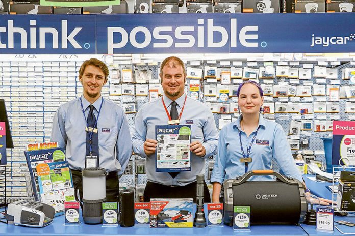 GET READY FOR YOUR ROAD TRIP… From left, Jaycar Electronics staff member, Mathew Vider, store manager, Chris Lane and duty manager, Jaclyn Williams are decked out to help with holiday gadgets. Photo: Katelyn Morse.