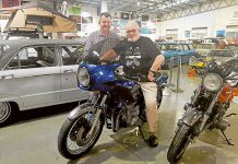 A ‘Mad’ visit to motor museum TOUCH OF FAME… From left, Shepparton Motor Museum curator, Shaun Lennard with actor and creator of the bikes used in the Mad Max film, Bertrand Cadart during his visit to the region last week as part of a filming of his documentary, Beneath the Outback Sun. Photo: Supplied.