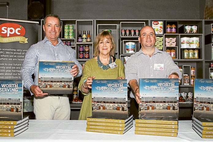 ED---SPC-100-years-book WORTH A READ… From left, SPC managing director, Reg Weine, author from Mountstephen Publishing, Jenny Mountstephen and Committee for Greater Shepparton CEO, Sam Birrell at the official book launch of ‘Worth Preserving 100 Years of SPC.’ Photo: David Lee.