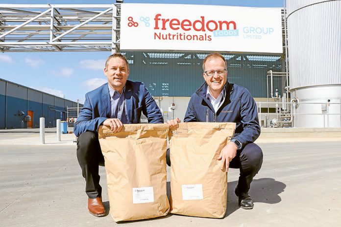 BIG BOOST FOR SHEPPARTON PLANT… From left, Freedom Foods Group chief operations officer, Timothy Moses and managing director, Rory Macleod with some of the new product that has just begun being produced at the Shepparton site’s new $50M specialty nutritional ingredients plant. Photo: Katelyn Morse.
