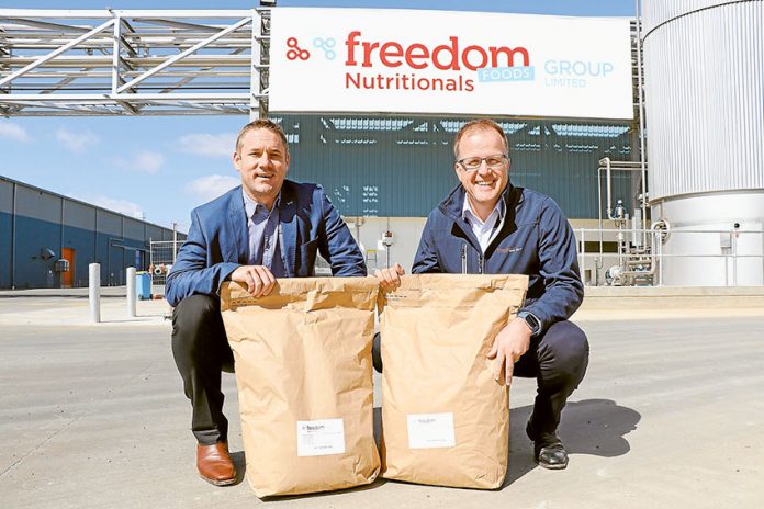 FP1---Freedom-Foods BIG BOOST FOR SHEPPARTON PLANT… From left, Freedom Foods Group chief operations officer, Timothy Moses and managing director, Rory Macleod with some of the new product that has just begun being produced at the Shepparton site’s new $50M specialty nutritional ingredients plant. Photo: Katelyn Morse.
