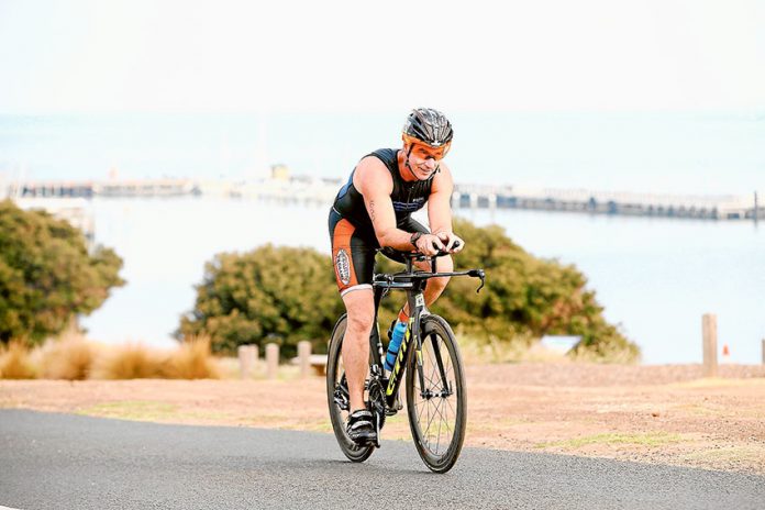 SPORT---Scott-McHugh-triathlon GOING ONE BETTER… Local resident and Shepparton Tri Club member, Scott McHugh took on the 2XU Triathlon Series Race 5 at Portarlington, where he finished with a time of 1 hour 50 minutes and 17 seconds, 10 minutes better than the last time he completed it. Photo: Supplied.