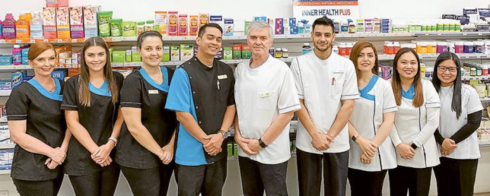 TRUSTED, KNOWLEDGABLE ADVICE… From left, Family Care Pharmacy retail manager, Anita Kuczynski, pharmacy assistant, Chloe Magill, pharmacy assistant, Angela Kalafatis, dispensary technician, Paul Heaton, owner/pharmacist, Peter Kuczynski, student pharmacist, Jaafar Algazali, intern pharmacist, Mariam Jallo, owner/pharmacist/manager, Cristina Sison-Heaton and pharmacist/owner, Joni Cenizal. Photo: Katelyn Morse.