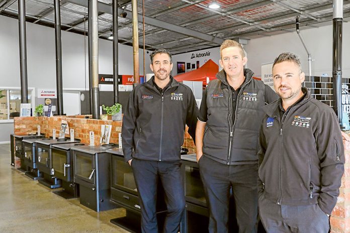 KEEP WARM THIS WINTER… From left, Hot and Cold Shop directors, Jade Tucker, Paul Marshall and Phill Lahm are gearing up for a huge sale this weekend. Photo: Katelyn Morse.