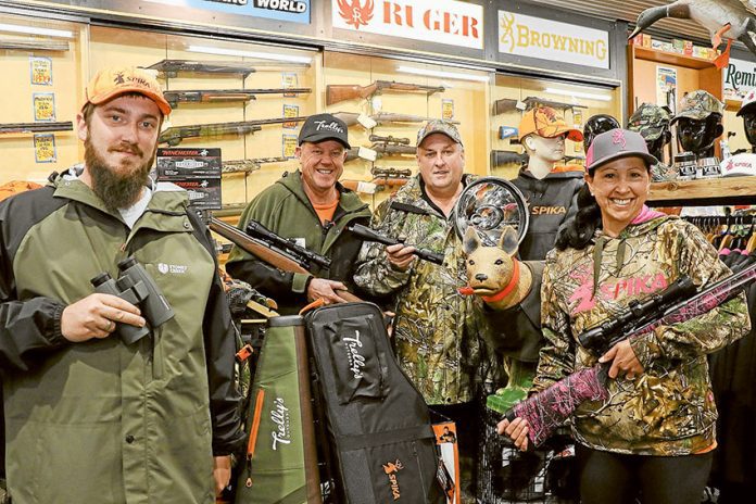 ADV---Trellys BARGAINS TARGETED… From left, Trelly’s Hunting and Fishing World team member, Brad Seiter, owner, Steve Threlfall, team member Rick Seiter and owner, Mary Threlfall are fully locked and loaded with stock as hunting season commences. Photo: Katelyn Morse.