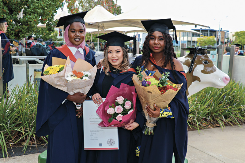 110 STUDENTS GRADUATED FROM LA TROBE UNIVERSITY last week... Fawzia Abkar, Jane Manalo and Benichou Mbenguele. Photos: Stephanie Holliday