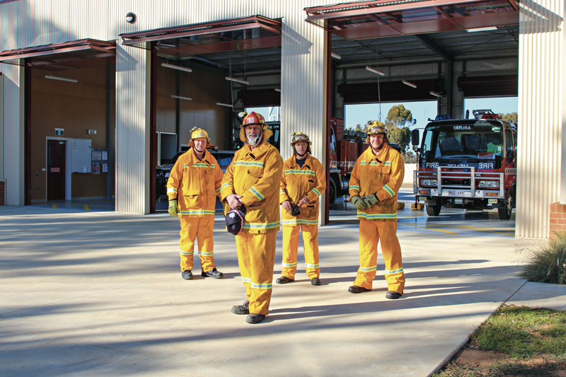 AT THE READY AND IN NEW DIGS... Members of the Tatura Country Fire Authority outside their new, up to the minute fire station, from left, Peter Fiddes, Captain Trevor Franklin, Peter Bevan and Alan Tyson. Photo: Steve Hutcheson