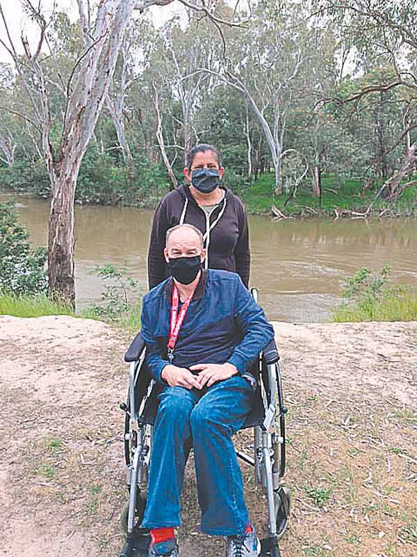 ED---STROKE-1 LOCAL SUPPORT... Gillian McLeod has opened with a Covid-friendly activity schedule to support people in post-stroke, to readjust to getting back into the community. Pictured are Steve who suffered a stroke 12 months ago and his partner Julia, enjoying a weekly walk. Photo: Supplied