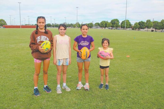 TOUCH FOOTBALL IN SHEPPARTON... The FREE junior touch football program is back and is once again open for all ages, all skills levels and playing experiences. Zahlia Kautai, Tennille Kautai, Aroha Kautai and Tavia Kautai enjoying the program recently. Photo: Supplied