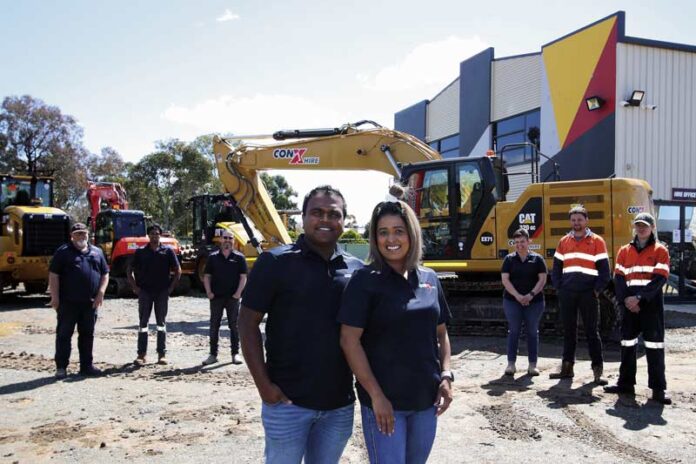 ED-CONX_55552 ALL YOUR MACHINERY NEEDS... ConX Hire’s owners Sam and Steph Boda in the centre front, with staff at the back from left, Darren, Ruwan, Paul, Roz, Austin and Ethan. Photo: Kelly Lucas.