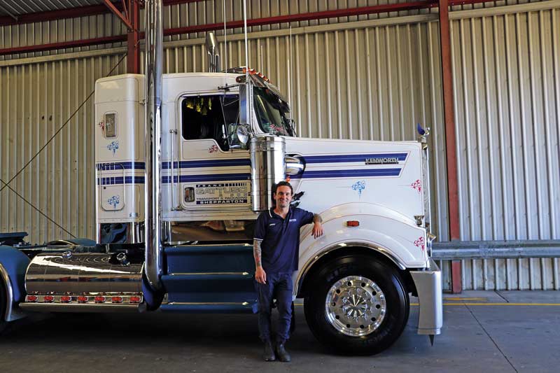 SECURING THE FUTURE... Jordan Gattuso, pictured with his immaculate 5-year-old Kenworth T909, is following his father’s footsteps in the family transport business. Photo: Melanie Spencer
