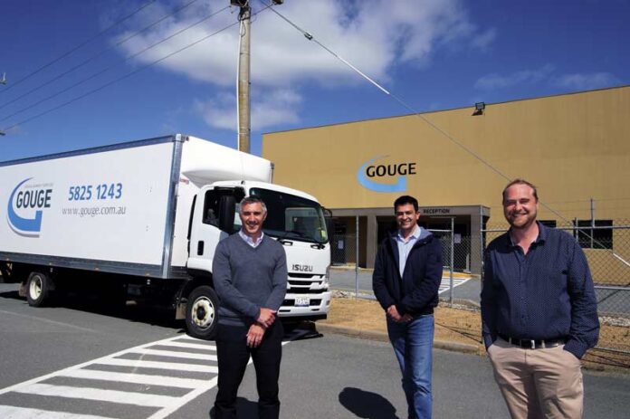 LAUNDRY LEADERS... Gouge Linen CEO John Calleja, director Rob Priestly and logistics manager, Matthew Barnes. Photo: Kelly Lucas.
