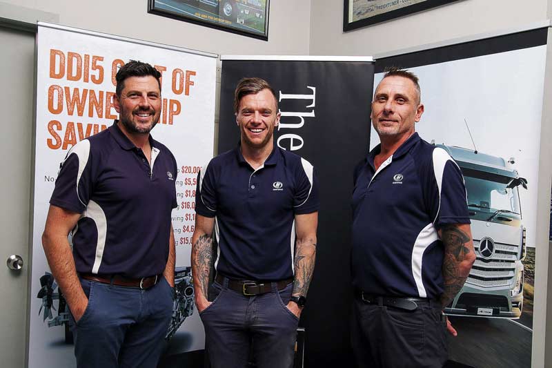 TACTICAL TRUCKING... Hartwigs Trucks branch manager, Simon Calogero with salesmen Russell Eden and Wayne Taylor are all extremely proud of their range of truck brands on hand and technology keeping their clients safe on the roads. Photo: Kelly Lucas.