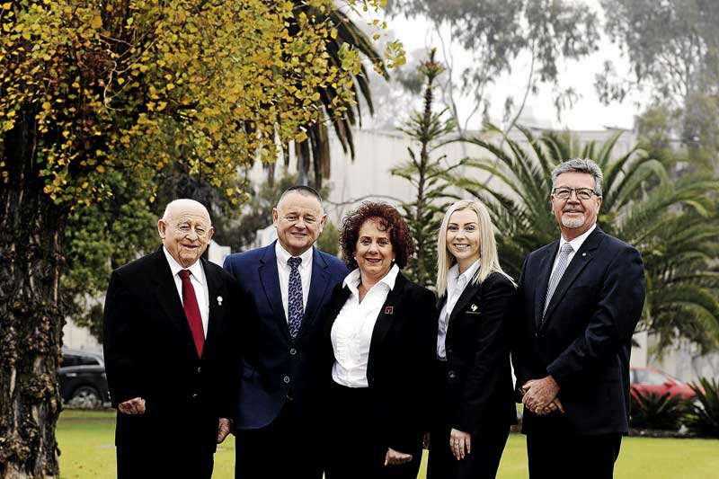 YOUNGS & CO REAL ESTATE... A family-owned and operated business that was founded in 1997 by Les, Glenn and Connie Young having served the area for many years... From left, consultant, Les Young and directors, Glenn and Connie Young, with licensed estate agent Bree Reeve and sales consultant, Michael Blake. Photo: Supplied