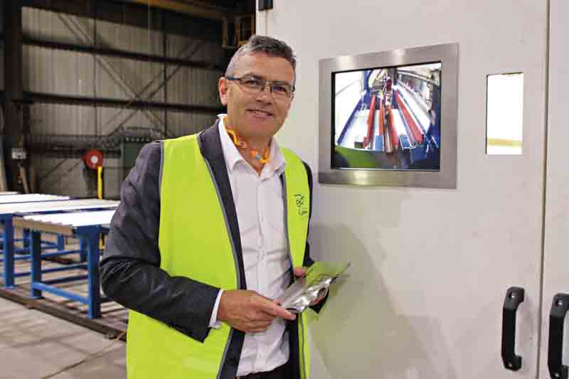 SHAPING OUR REGION’S HISTORY... J Furphy & Sons managing director, Adam Furphy, standing by a laser welding station. Photo: Steve Hutcheson