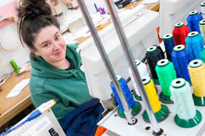 ADV---SHEPP-WORKWEAR NEED YOUR NAME ON IT... Shepparton Workwear and Safety embroider Nateasha Wilson, using one of the state-of-the-art industrial sewing machines putting business logos on uniforms. Photo: Kelly Carmody