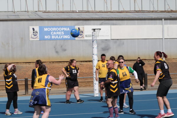OPEN AGE COMPETITION ON COURT...In the spirit of sportsmanship, teams of all ages competed against each other on the court and on the field.